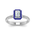 Load image into Gallery viewer, hand-engraved-emerald-cut-halo-diamond-engagement-ring-with-sapphire-in-white-gold-FD8588EMRGSABLANGLE5-NL-WG_f4b4eba3-6bfa-4a72-9286-99e33d971054?v=1757588497
