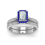 Load image into Gallery viewer, hand-engraved-emerald-cut-halo-diamond-wedding-ring-set-with-sapphire-in-white-gold-FD8588EMGSABLANGLE5-NL-WG_4b7ca71b-8715-406b-9fc3-34010837c3e0?v=1757665327
