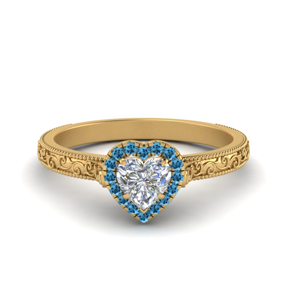 hand-engraved-heart-shaped-halo-diamond-engagement-ring-with-blue-topaz-in-yellow-gold-FD8588HTRGICBLTO-NL-YG_637e2d36-f9ea-422a-a01c-a6fd3833ef67?v=1757588508