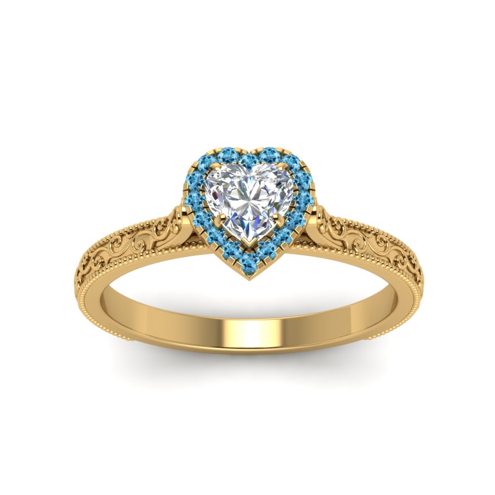 hand-engraved-heart-shaped-halo-diamond-engagement-ring-with-blue-topaz-in-yellow-gold-FD8588HTRGICBLTOANGLE5-NL-YG_636dd462-79ad-4e52-9ffb-34c0308e4d0f?v=1757588508