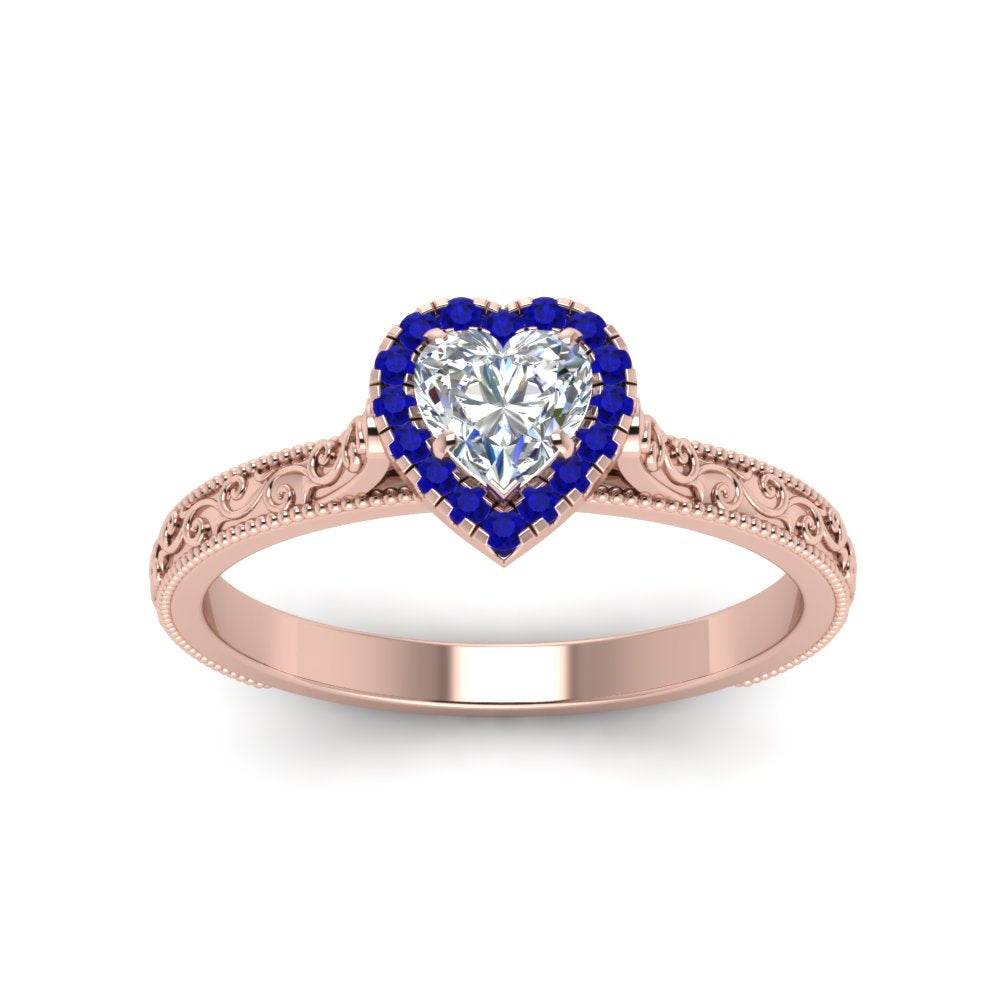 hand-engraved-heart-shaped-halo-diamond-engagement-ring-with-sapphire-in-rose-gold-FD8588HTRGSABLANGLE5-NL-RG_3a5a71fe-9037-4be6-8f1d-b1e5f0e8d579?v=1757588508