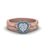 Load image into Gallery viewer, hand-engraved-heart-shaped-halo-diamond-wedding-ring-set-with-blue-topaz-in-rose-gold-FD8588HTGICBLTO-NL-RG_9a75465c-fa2c-4b87-bf77-3c3209502606?v=1757665338

