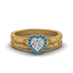 Load image into Gallery viewer, hand-engraved-heart-shaped-halo-diamond-wedding-ring-set-with-blue-topaz-in-yellow-gold-FD8588HTGICBLTO-NL-YG?v=1757665187
