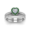 Load image into Gallery viewer, hand-engraved-heart-shaped-halo-diamond-wedding-ring-set-with-emerald-in-white-gold-FD8588HTGEMGRANGLE5-NL-WG_f11738f0-e3bc-43ee-a6fa-503a52ea3d72?v=1757665338