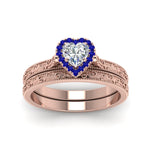 Load image into Gallery viewer, hand-engraved-heart-shaped-halo-diamond-wedding-ring-set-with-sapphire-in-rose-gold-FD8588HTGSABLANGLE5-NL-RG?v=1757665187
