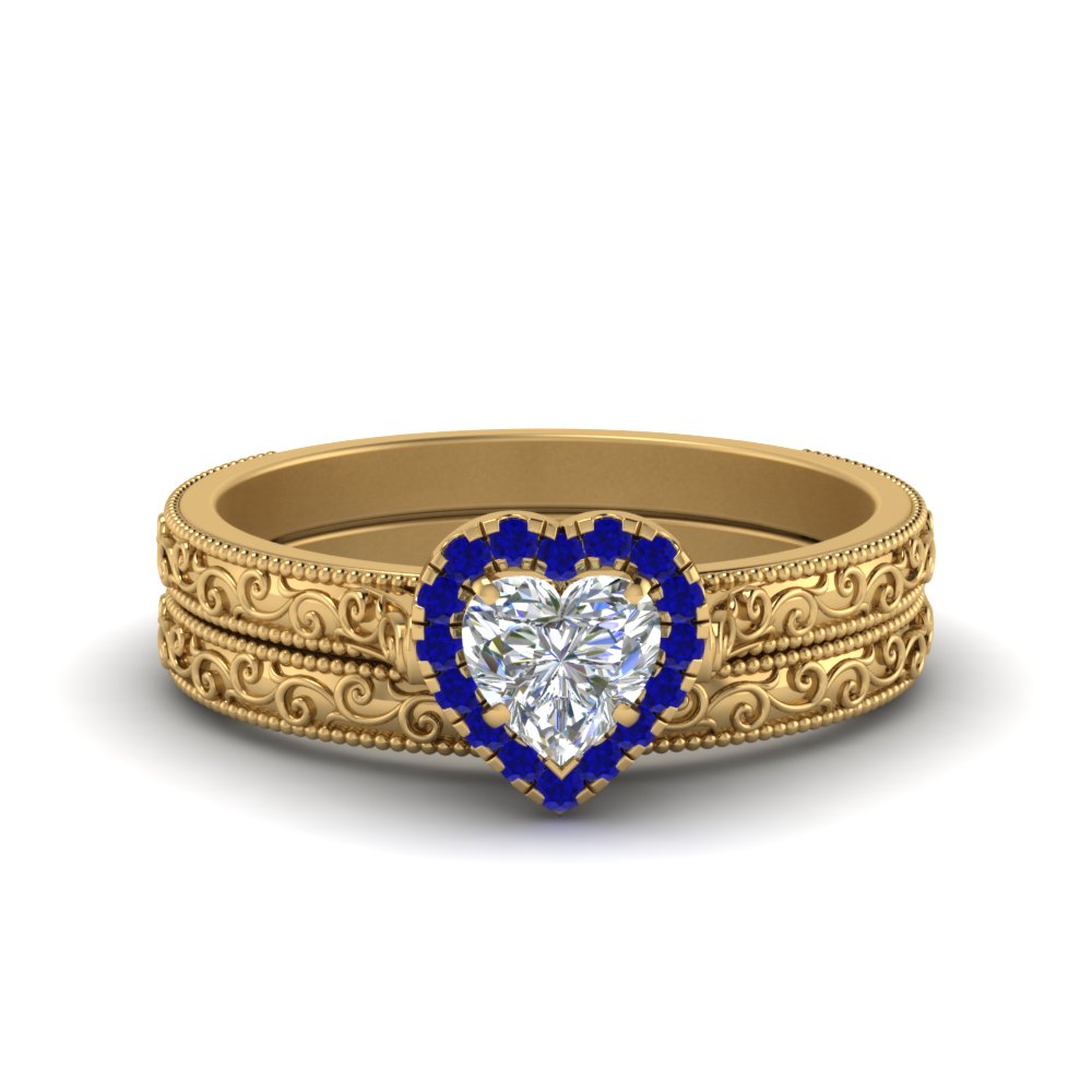 hand-engraved-heart-shaped-halo-diamond-wedding-ring-set-with-sapphire-in-yellow-gold-FD8588HTGSABL-NL-YG_727ea2e6-10a1-4223-b982-3b6ce46177e2?v=1757665338