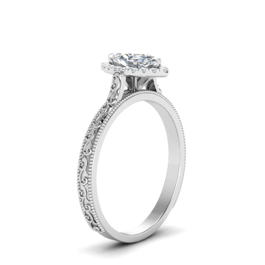 hand-engraved-marquise-cut-halo-diamond-engagement-ring-in-white-gold-FD8588MQRANGLE2-NL-WG_d03f59ab-764d-44d9-a11b-d97aa4fcf063?v=1757588520