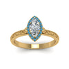 Load image into Gallery viewer, hand-engraved-marquise-cut-halo-diamond-engagement-ring-with-blue-topaz-in-yellow-gold-FD8588MQRGICBLTOANGLE5-NL-YG_669e3eff-55a1-4a35-8d02-5975b6c375df?v=1757588520