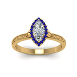 Load image into Gallery viewer, hand-engraved-marquise-cut-halo-diamond-engagement-ring-with-sapphire-in-yellow-gold-FD8588MQRGSABLANGLE5-NL-YG_39ca8359-734d-43e2-bceb-4c37833312b6?v=1757588520
