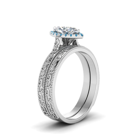 hand-engraved-marquise-cut-halo-diamond-wedding-ring-set-with-blue-topaz-in-white-gold-FD8588MQGICBLTOANGLE2-NL-WG_e86795e8-6eaf-4841-a062-035874782519?v=1757665350