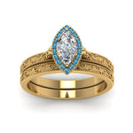 Load image into Gallery viewer, hand-engraved-marquise-cut-halo-diamond-wedding-ring-set-with-blue-topaz-in-yellow-gold-FD8588MQGICBLTOANGLE5-NL-YG?v=1757665205