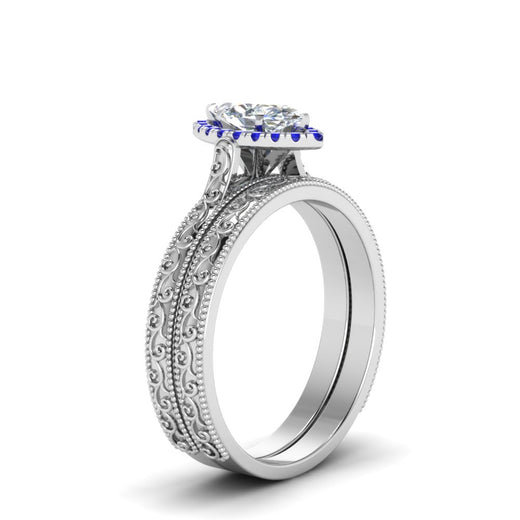 hand-engraved-marquise-cut-halo-diamond-wedding-ring-set-with-sapphire-in-white-gold-FD8588MQGSABLANGLE2-NL-WG_df43e6f9-ec5a-425a-9a97-17c92bc2a668?v=1757665349