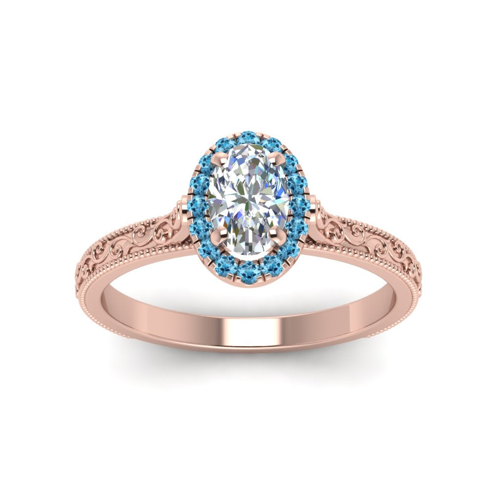hand-engraved-oval-shaped-halo-diamond-engagement-ring-with-blue-topaz-in-rose-gold-FD8588OVRGICBLTOANGLE5-NL-RG_48815864-5b72-4232-9d48-9d37cfb23fb0?v=1757588531