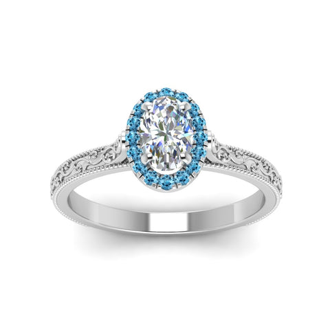 hand-engraved-oval-shaped-halo-diamond-engagement-ring-with-blue-topaz-in-white-gold-FD8588OVRGICBLTOANGLE5-NL-WG?v=1757588385