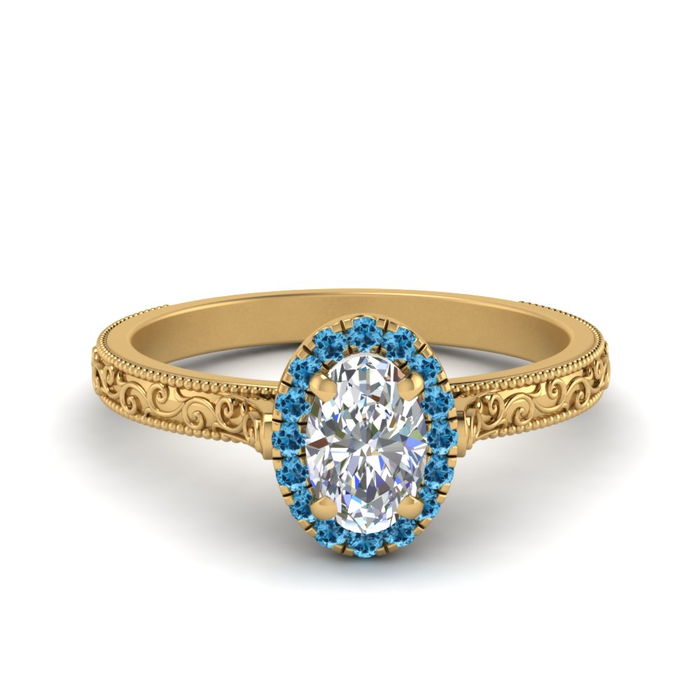 hand-engraved-oval-shaped-halo-diamond-engagement-ring-with-blue-topaz-in-yellow-gold-FD8588OVRGICBLTO-NL-YG?v=1757588385