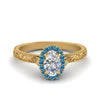 Load image into Gallery viewer, hand-engraved-oval-shaped-halo-diamond-engagement-ring-with-blue-topaz-in-yellow-gold-FD8588OVRGICBLTO-NL-YG_f9ad069a-2f96-4bf0-8424-8769f19d046f?v=1757588532