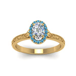 Load image into Gallery viewer, hand-engraved-oval-shaped-halo-diamond-engagement-ring-with-blue-topaz-in-yellow-gold-FD8588OVRGICBLTOANGLE5-NL-YG_1a420a9b-c888-486c-840f-881c78074d20?v=1757588531
