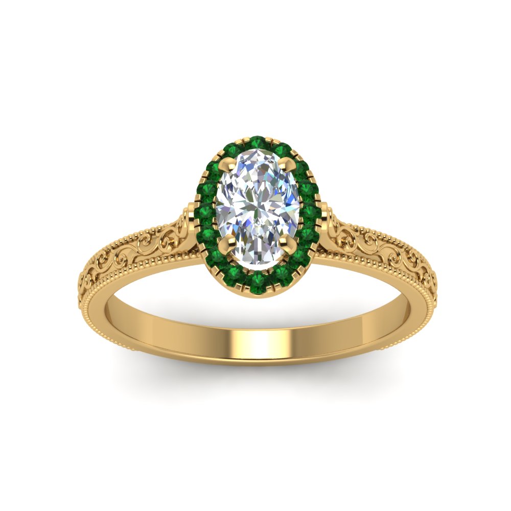 hand-engraved-oval-shaped-halo-diamond-engagement-ring-with-emerald-in-yellow-gold-FD8588OVRGEMGRANGLE5-NL-YG?v=1757588384