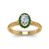 Load image into Gallery viewer, hand-engraved-oval-shaped-halo-diamond-engagement-ring-with-emerald-in-yellow-gold-FD8588OVRGEMGRANGLE5-NL-YG_35619e71-26eb-4bdb-87e6-40eada1b69f7?v=1757588531