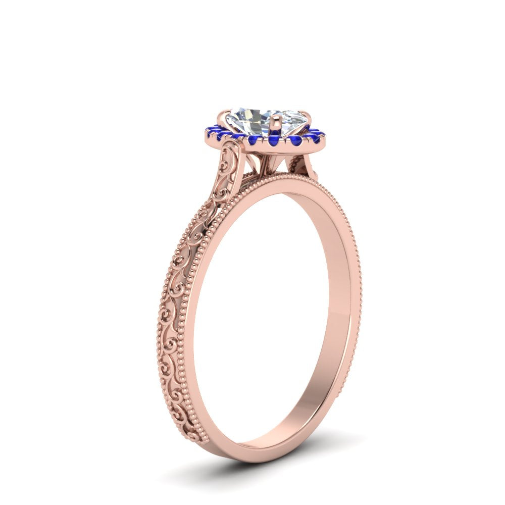 hand-engraved-oval-shaped-halo-diamond-engagement-ring-with-sapphire-in-rose-gold-FD8588OVRGSABLANGLE2-NL-RG?v=1757588532