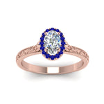 Load image into Gallery viewer, hand-engraved-oval-shaped-halo-diamond-engagement-ring-with-sapphire-in-rose-gold-FD8588OVRGSABLANGLE5-NL-RG_529dabfa-e88d-4984-a64a-5bdbc7cabd1c?v=1757588532
