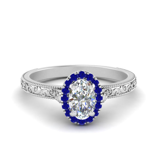 hand-engraved-oval-shaped-halo-diamond-engagement-ring-with-sapphire-in-white-gold-FD8588OVRGSABL-NL-WG_36e1b2f4-8d87-4650-9abd-0ab4eac3b81a?v=1757588531