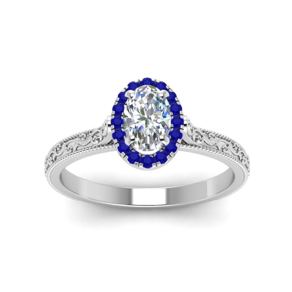 hand-engraved-oval-shaped-halo-diamond-engagement-ring-with-sapphire-in-white-gold-FD8588OVRGSABLANGLE5-NL-WG?v=1757588384