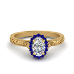 Load image into Gallery viewer, hand-engraved-oval-shaped-halo-diamond-engagement-ring-with-sapphire-in-yellow-gold-FD8588OVRGSABL-NL-YG?v=1757588384