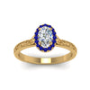 Load image into Gallery viewer, hand-engraved-oval-shaped-halo-diamond-engagement-ring-with-sapphire-in-yellow-gold-FD8588OVRGSABLANGLE5-NL-YG_24235202-754d-4e08-a6ae-c6d92a9e4f8d?v=1757588530