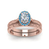 Load image into Gallery viewer, hand-engraved-oval-shaped-halo-diamond-wedding-ring-set-with-blue-topaz-in-rose-gold-FD8588OVGICBLTOANGLE5-NL-RG_aba80364-17af-42e5-85e9-f42208e291b8?v=1757665361