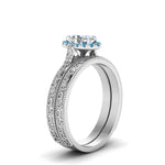 Load image into Gallery viewer, hand-engraved-oval-shaped-halo-diamond-wedding-ring-set-with-blue-topaz-in-white-gold-FD8588OVGICBLTOANGLE2-NL-WG_1410283a-4322-44b5-bb7d-eb0a1b01aeb4?v=1757665361
