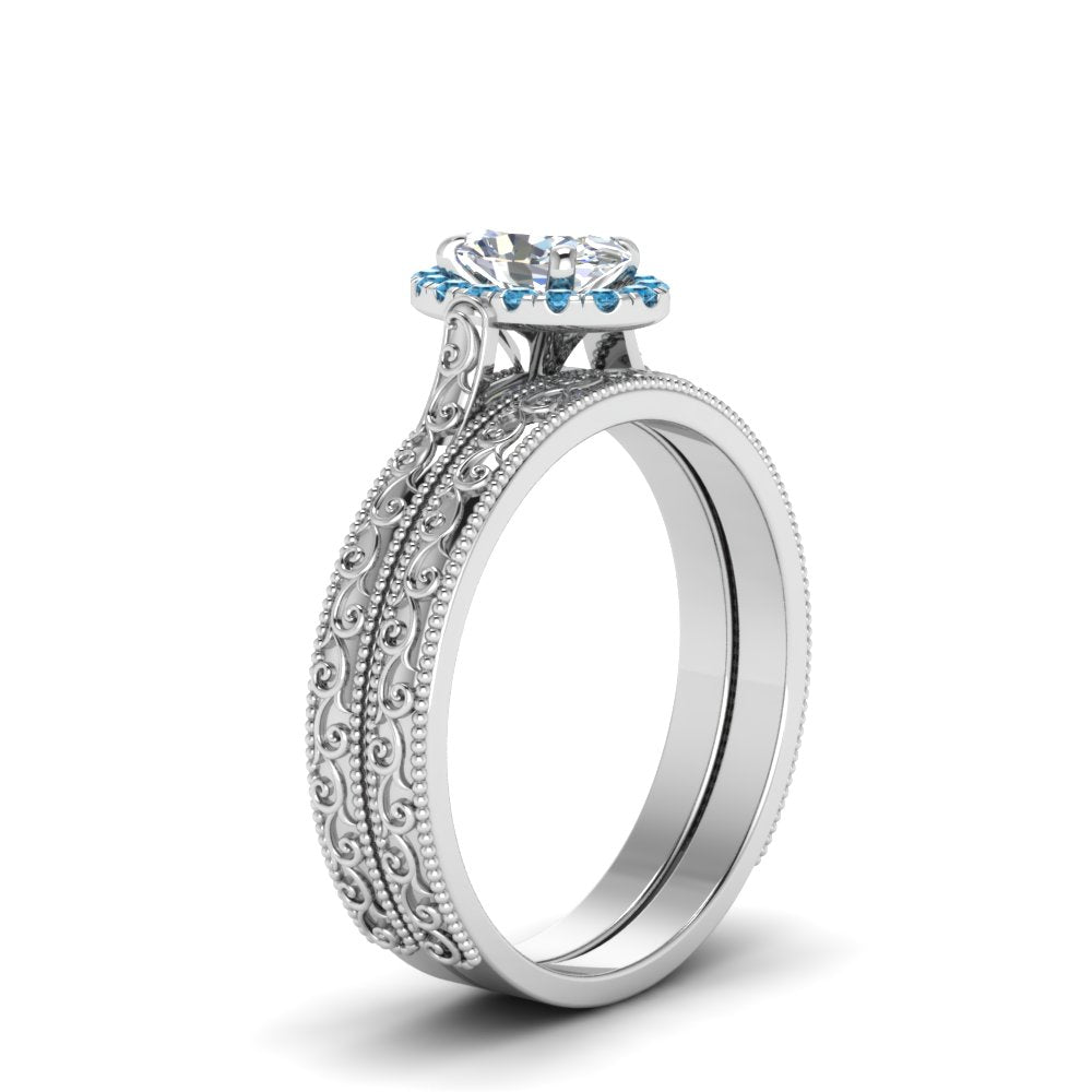hand-engraved-oval-shaped-halo-diamond-wedding-ring-set-with-blue-topaz-in-white-gold-FD8588OVGICBLTOANGLE2-NL-WG_1410283a-4322-44b5-bb7d-eb0a1b01aeb4?v=1757665361