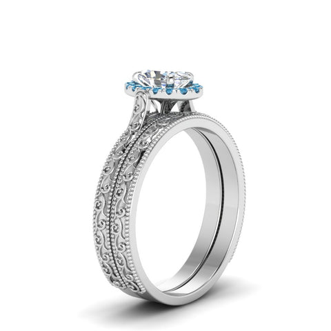 hand-engraved-oval-shaped-halo-diamond-wedding-ring-set-with-blue-topaz-in-white-gold-FD8588OVGICBLTOANGLE2-NL-WG?v=1757665222