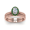 Load image into Gallery viewer, hand-engraved-oval-shaped-halo-diamond-wedding-ring-set-with-emerald-in-rose-gold-FD8588OVGEMGRANGLE5-NL-RG_07230ea3-1055-43af-bb1f-5dce41f41701?v=1757665361