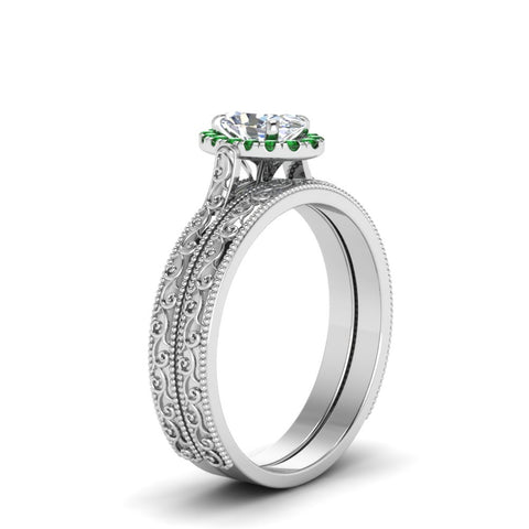 hand-engraved-oval-shaped-halo-diamond-wedding-ring-set-with-emerald-in-white-gold-FD8588OVGEMGRANGLE2-NL-WG_0e3e0b73-bcca-4385-bdf3-98776e0eb05b?v=1757665361