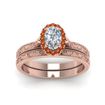 Load image into Gallery viewer, hand-engraved-oval-shaped-halo-diamond-wedding-ring-set-with-orange-sapphire-in-rose-gold-FD8588OVGSAORANGLE5-NL-RG_020422c0-0319-46a6-a9e0-8e30ed947b91?v=1757665361
