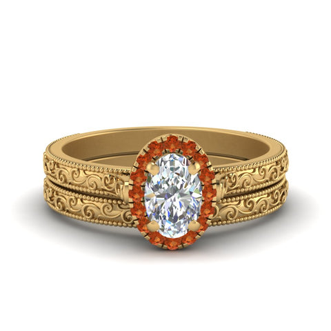 hand-engraved-oval-shaped-halo-diamond-wedding-ring-set-with-orange-sapphire-in-yellow-gold-FD8588OVGSAOR-NL-YG?v=1757665222