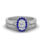 Load image into Gallery viewer, hand-engraved-oval-shaped-halo-diamond-wedding-ring-set-with-sapphire-in-white-gold-FD8588OVGSABL-NL-WG_5436247d-3c11-4583-909d-b901fda24dd9?v=1757665361
