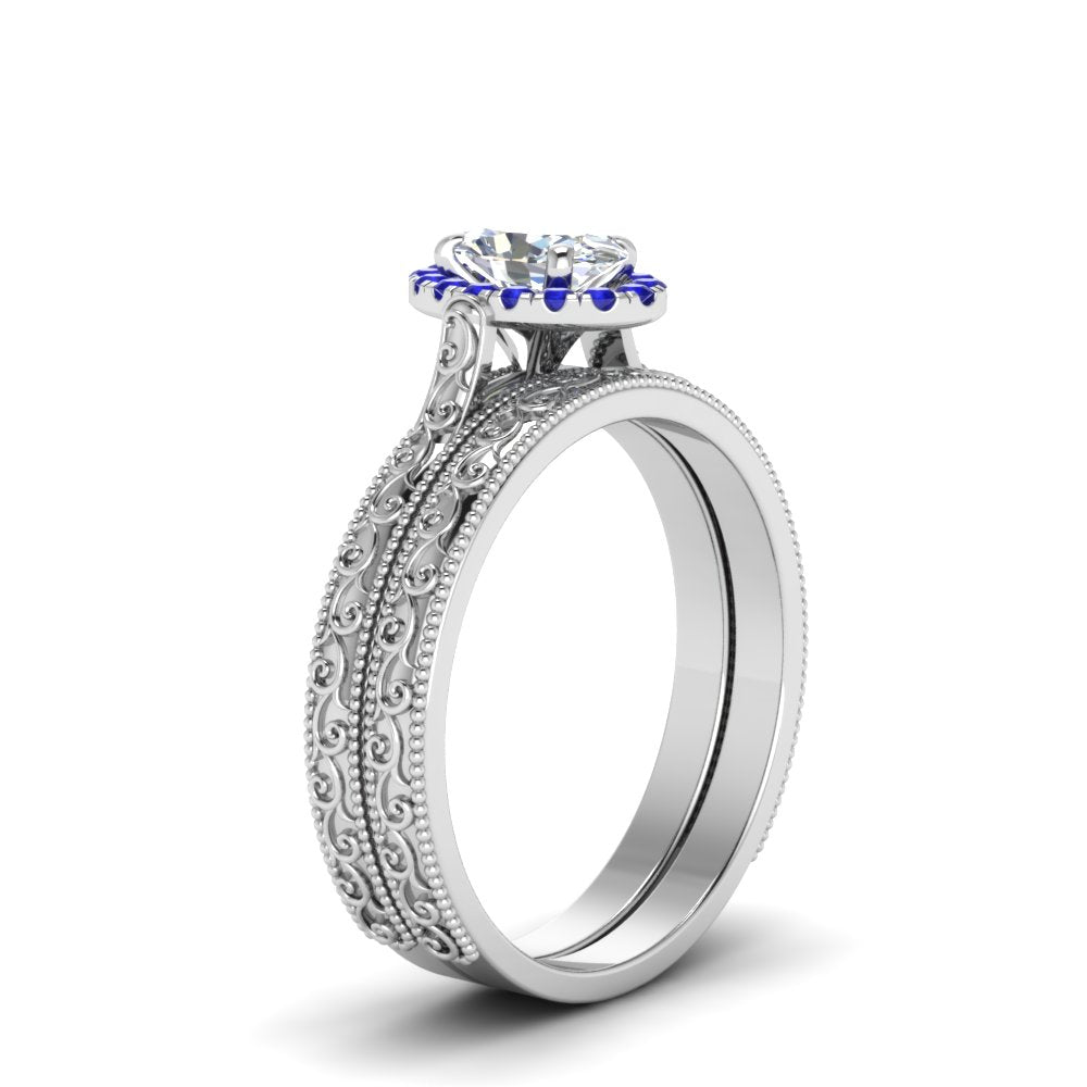 hand-engraved-oval-shaped-halo-diamond-wedding-ring-set-with-sapphire-in-white-gold-FD8588OVGSABLANGLE2-NL-WG_102ee030-1584-4cd8-91ee-cb2554447e54?v=1757665361