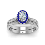 Load image into Gallery viewer, hand-engraved-oval-shaped-halo-diamond-wedding-ring-set-with-sapphire-in-white-gold-FD8588OVGSABLANGLE5-NL-WG?v=1757665222