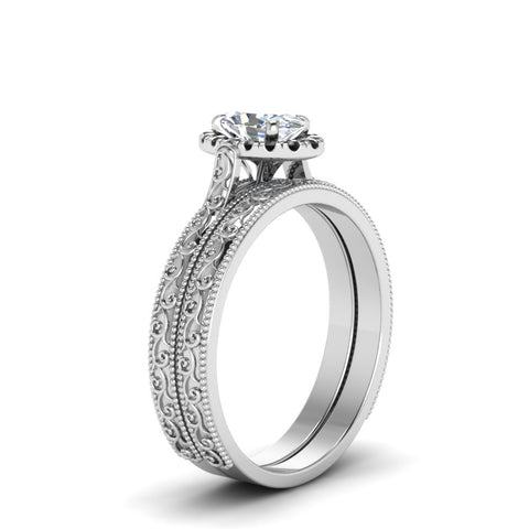 hand-engraved-oval-shaped-halo-wedding-ring-set-with-black-diamond-in-white-gold-FD8588OVGBLACKANGLE2-NL-WG?v=1757665222