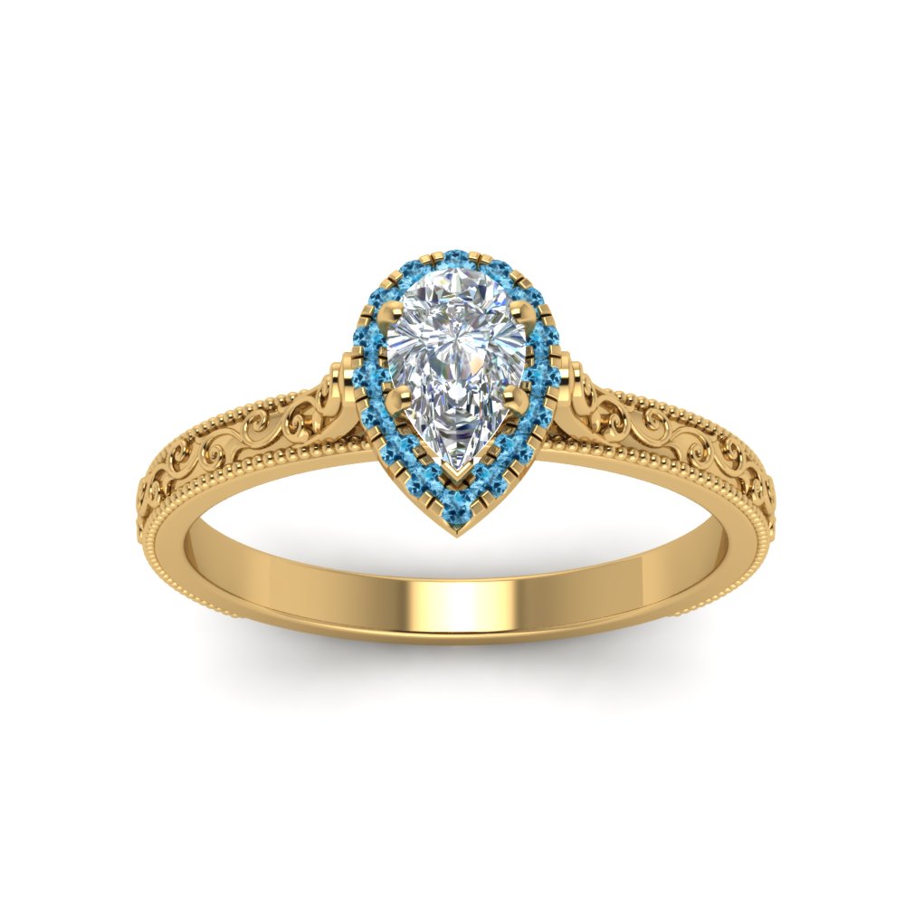 hand-engraved-pear-shaped-halo-diamond-engagement-ring-with-blue-topaz-in-yellow-gold-FD8588PERGICBLTOANGLE5-NL-YG_f8cf805a-f283-4229-a6ea-fff61fe714a2?v=1757588544
