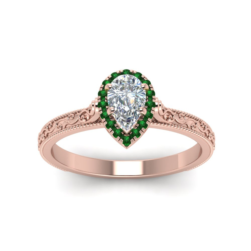 hand-engraved-pear-shaped-halo-diamond-engagement-ring-with-emerald-in-rose-gold-FD8588PERGEMGRANGLE5-NL-RG_33b8288a-f0ef-4597-85af-e68168d644a6?v=1757588543
