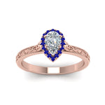 Load image into Gallery viewer, hand-engraved-pear-shaped-halo-diamond-engagement-ring-with-sapphire-in-rose-gold-FD8588PERGSABLANGLE5-NL-RG_e336e348-4921-4a32-97ca-37dc9d67cbe8?v=1757588542
