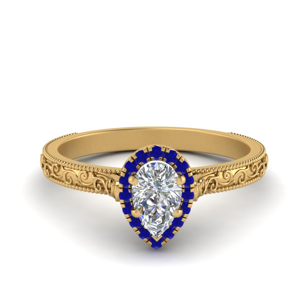 hand-engraved-pear-shaped-halo-diamond-engagement-ring-with-sapphire-in-yellow-gold-FD8588PERGSABL-NL-YG_f428472b-d142-483e-a6ed-fb8a94e9abeb?v=1757588542