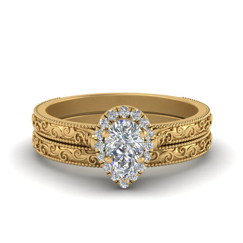 hand-engraved-pear-shaped-halo-diamond-wedding-ring-set-in-yellow-gold-FD8588PE-NL-YG_c3bb2028-0bb0-4cd9-b5d3-9b08d179a807?v=1757665372
