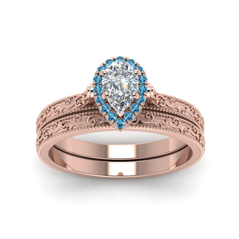 hand-engraved-pear-shaped-halo-diamond-wedding-ring-set-with-blue-topaz-in-rose-gold-FD8588PEGICBLTOANGLE5-NL-RG_ee83b88f-26ff-4e12-aabd-3e8a46d87ade?v=1757665372