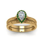 Load image into Gallery viewer, hand-engraved-pear-shaped-halo-diamond-wedding-ring-set-with-emerald-in-yellow-gold-FD8588PEGEMGRANGLE5-NL-YG?v=1757665239

