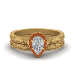 Load image into Gallery viewer, hand-engraved-pear-shaped-halo-diamond-wedding-ring-set-with-orange-sapphire-in-yellow-gold-FD8588PEGSAOR-NL-YG?v=1757665239
