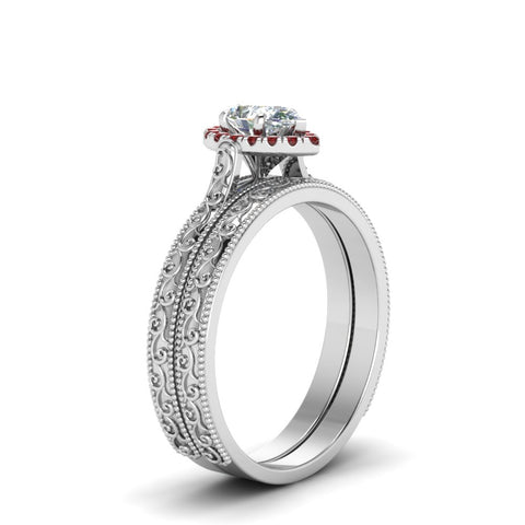hand-engraved-pear-shaped-halo-diamond-wedding-ring-set-with-ruby-in-white-gold-FD8588PEGRUDRANGLE2-NL-WG_80bc1dd3-1853-44c3-bca4-64aa9883aa4f?v=1757665372